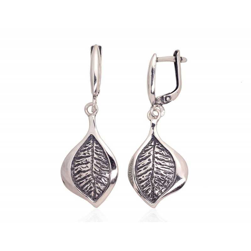 Sidabriniai auskarai ant cilindrinės spynos